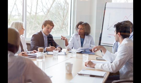 A group of doctors in a meeting